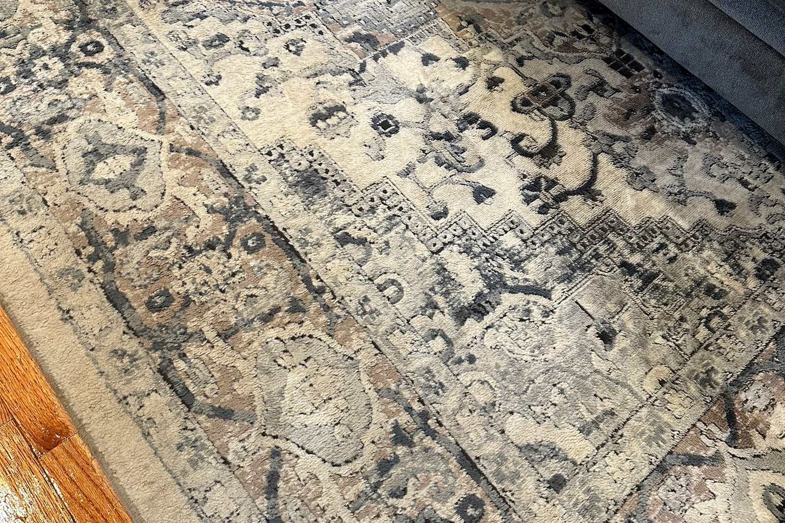 The same oriental rug finished, the pattern sharp and the ground even