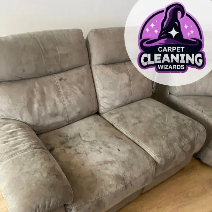 Soiled fabric sofa in Elizabeth NJ photographed before cleaning by Carpet Cleaning Wizards